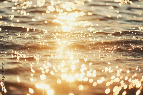 Glimmering sunlight dances across tranquil water on a bright afternoon photo