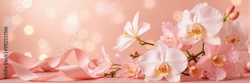 Elegant orchids and lilies adorned with pink silk ribbons, romance photo