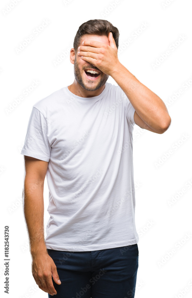 Young handsome man over isolated background smiling and laughing with hand on face covering eyes for surprise. Blind concept. Young handsome man over isolated background smiling and laughing with hand on face covering eyes for surprise. Blind concept.