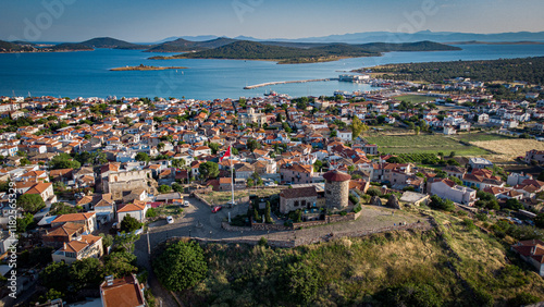 Aerial view of Alibey Island with mill, sea and Turkish flag. Turkey. photo