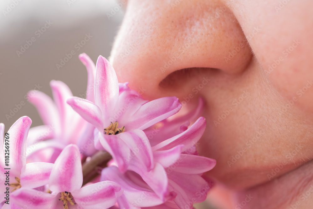 close-up Female face lights up with delight savors sweet scent hyacinth, capturing joy of springtime and beauty of nature, while also raising awareness of seasonal allergies, Sensory Experience close-up Female face lights up with delight savors sweet scent hyacinth, capturing joy of springtime and beauty of nature, while also raising awareness of seasonal allergies, Sensory Experience