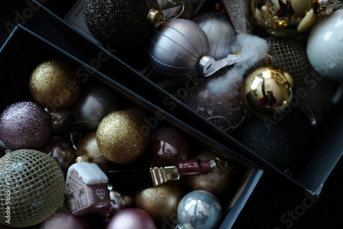 christmas ornaments in a cardboard boxes photo