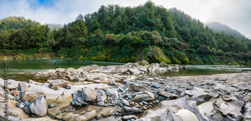 The Buller river flowing through the forest covered upper Buller Gorge  near the longest suspension bridge in NZ