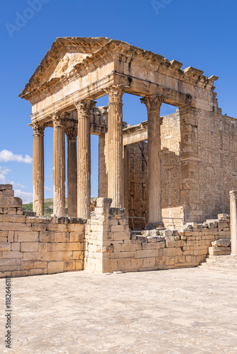 Dougga, Beja, Tunisia. The Capitol Temple at the Roman ruins. photo