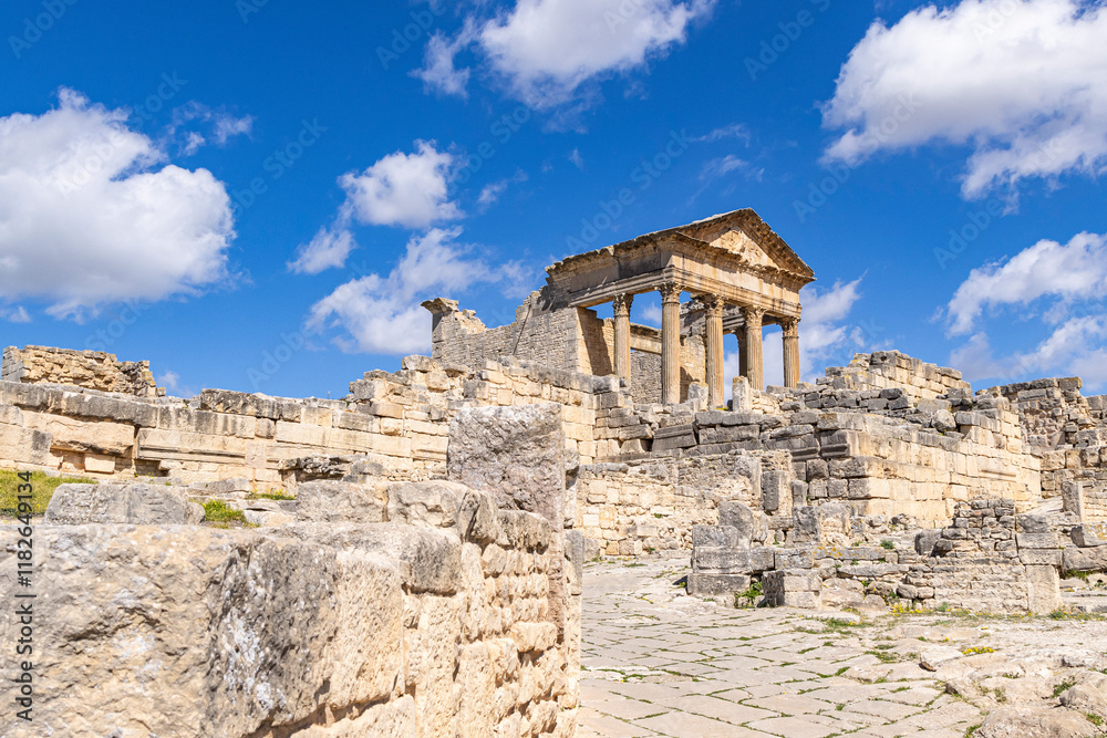 Naklejka premium Dougga, Beja, Tunisia. The Capitol Temple at the Roman ruins.