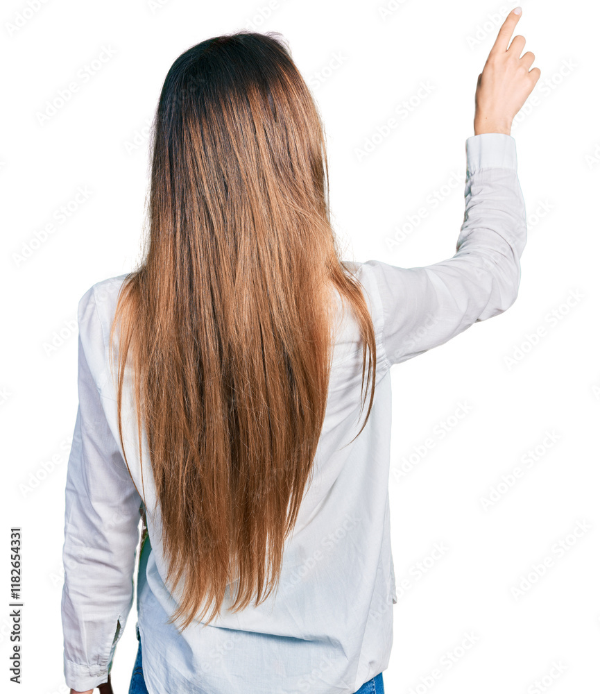Beautiful caucasian woman wearing casual white shirt posing backwards pointing ahead with finger hand Beautiful caucasian woman wearing casual white shirt posing backwards pointing ahead with finger hand