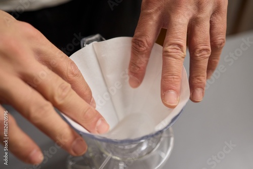 Preparing a delightful cup of coffee using the filter and pour over technique is an art photo