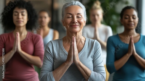 Diverse group of individuals practicing mindfulness and wellness in a serene indoor environment during a morning session