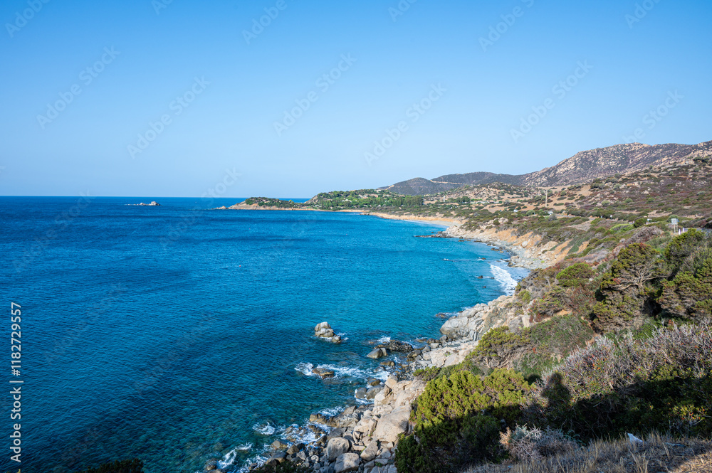 The beautiful beach of Porto Sa Ruxi in Sardinia with white sand and transparent blue and turquoise water