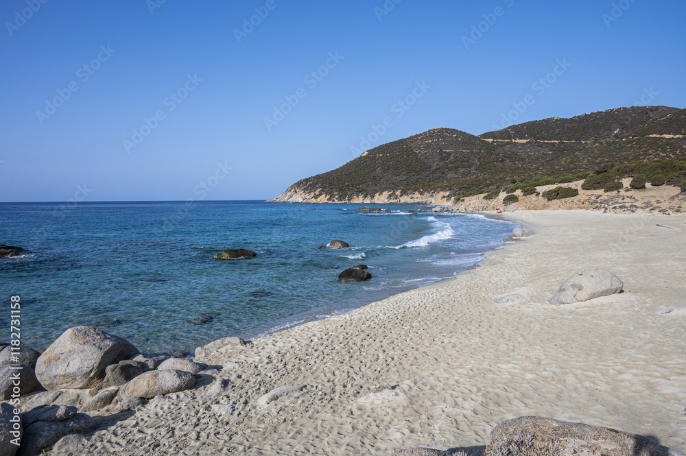 The beautiful beach of Porto Sa Ruxi in Sardinia with white sand and transparent blue and turquoise water