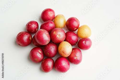 Heap of mini red potatoes, white background