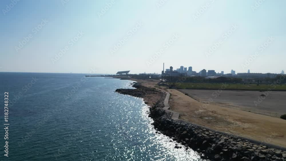 Cinematic clip shows serene water and a stunning cityscape backdrop Cinematic clip shows serene water and a stunning cityscape backdrop