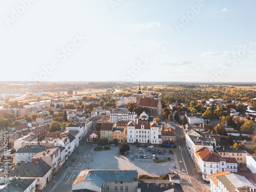 Obraz na płótnie Summer aerial skyline cityscape of Town Square and Town Hall in Śrem (Rynek Miejski i Urząd Miejski w Śremie). Wielkopolska, Poland at sunset w salonie
