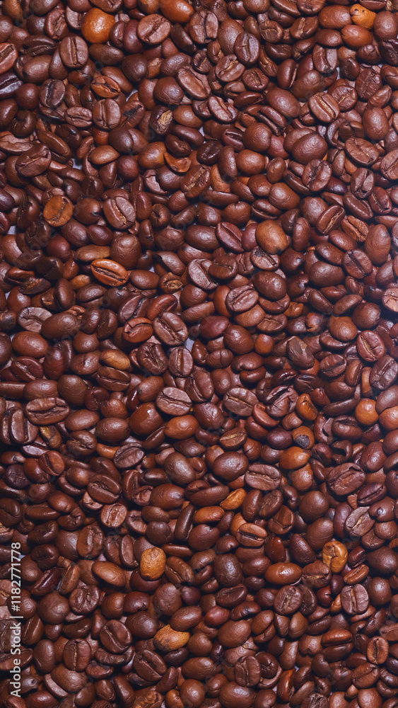 A stock photo showcasing a reddish-brown pattern of coffee beans, highlighting their enticing texture and inviting appearance, perfect for culinary or lifestyle content.