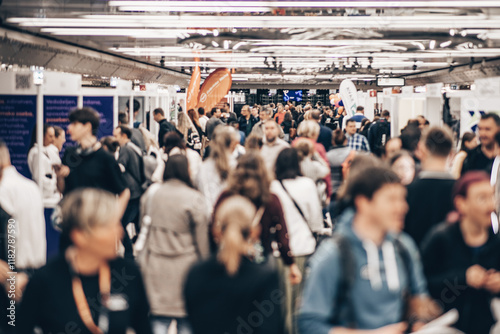 Abstract blurred people at exhibition hall of expo event trade show. Business convention show or job fair. Business concept background