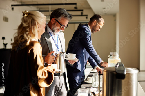Colleagues chatting on a coffee break