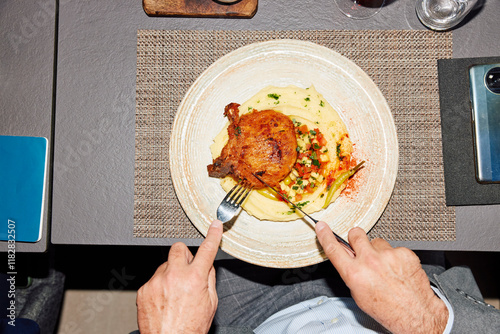 Man consuming a meal in a restaurant