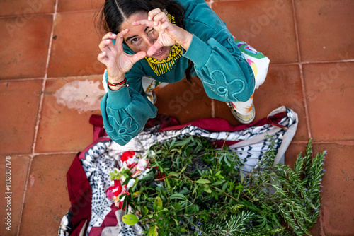 Indigenous woman in love with herbs photo