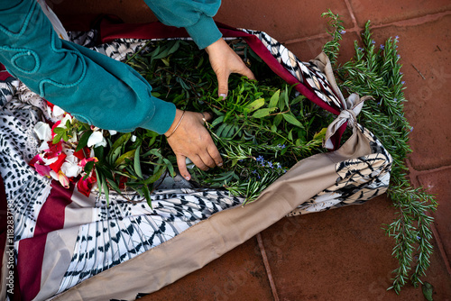 Indigenous woman with herbs photo