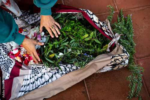 Indigenous woman with herbs photo