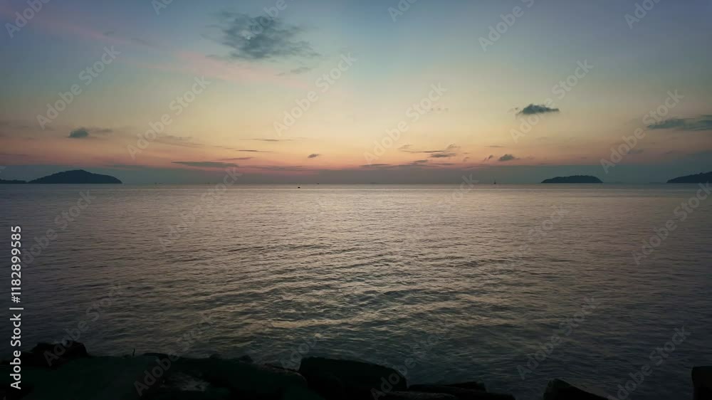 Time lapse of Majestic sunrise clouds over sea landscape,Amazing light of nature cloudscape sky and Clouds moving away rolling colorful sunrise clouds,Footage timelapse,Nature environment background