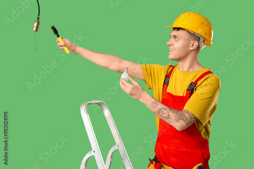 Young male electrician on s...