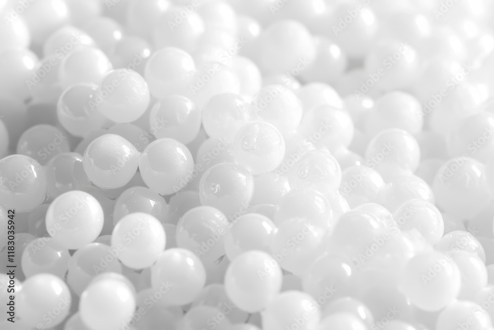 Close-up of numerous small, white spheres. Perfect for purity, cleanliness, or minimalist designs. Close-up of numerous small, white spheres. Perfect for purity, cleanliness, or minimalist designs.