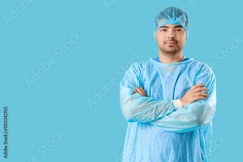 Male doctor with crossed ar...