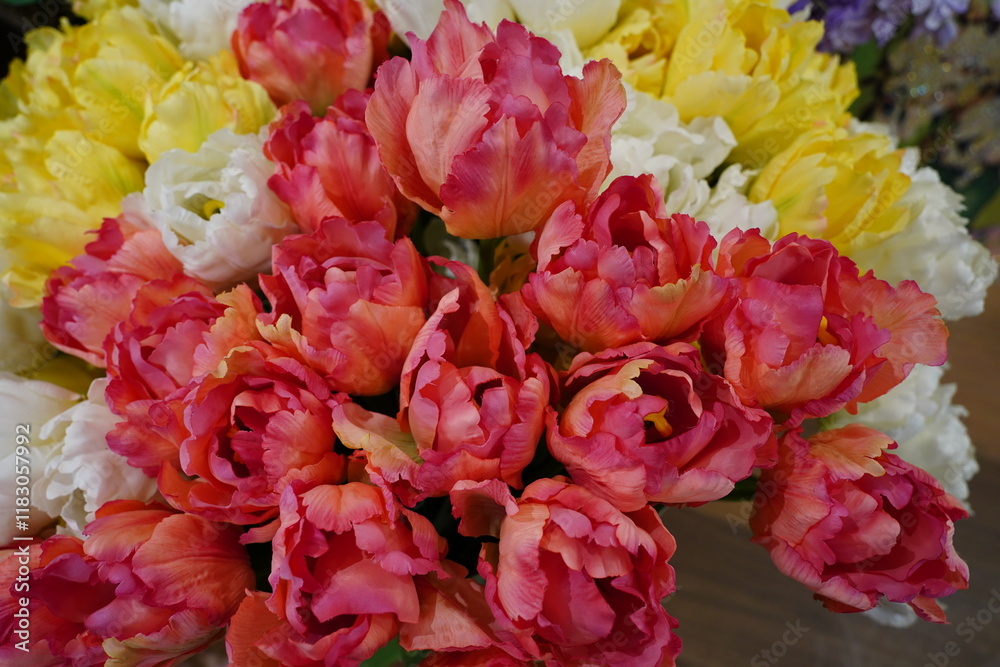 bouquet of tulips in various shades of pink and yellow bouquet of tulips in various shades of pink and yellow