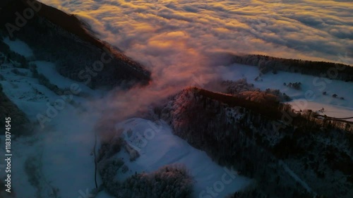 Beautiful cover of clouds over central Switzerland. View on the last sunrise of the year 2024.
