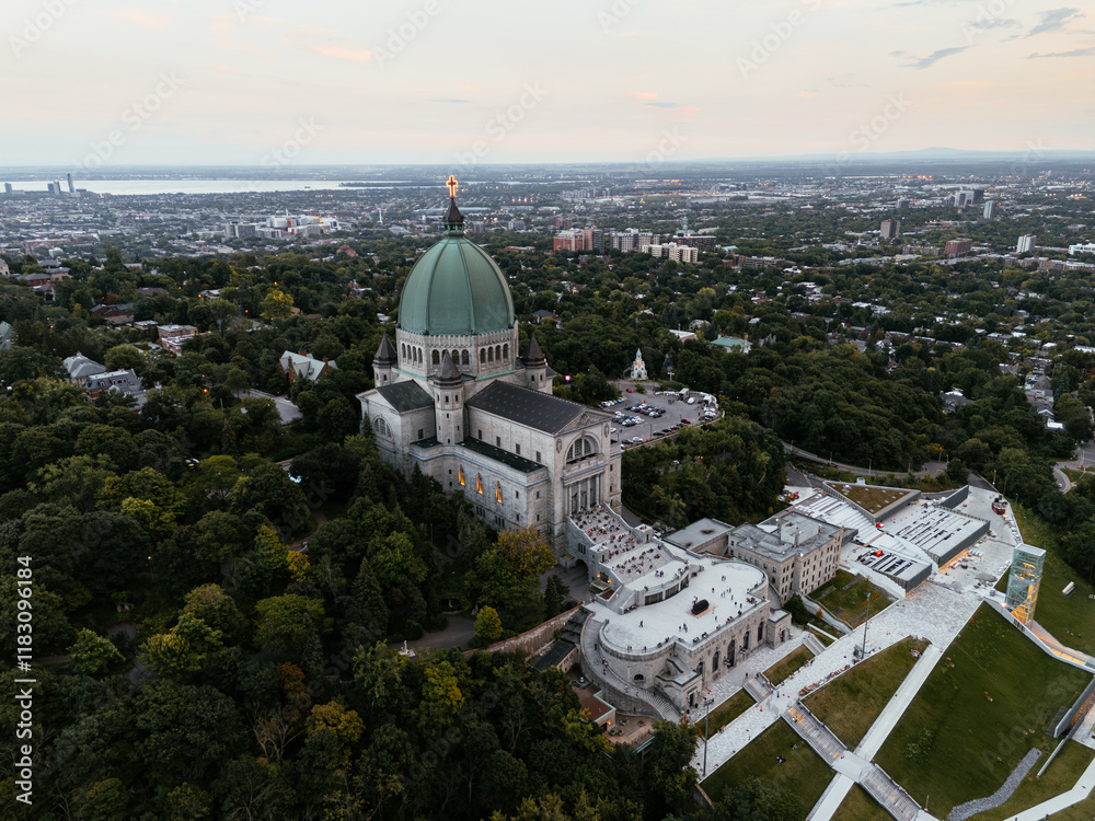Fototapeta premium Aerial view of St. Josephs Oratory of Mount Royal at Sunset in winter. Montreal, Quebec, Canada