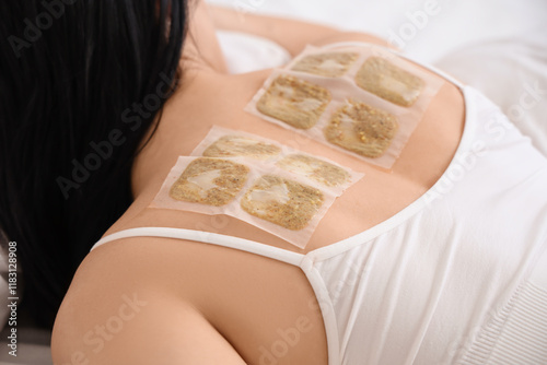Young woman with mustard pl...