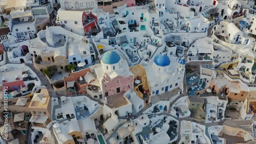 Aerial view of Oia town with blue dome churches, Santorini island, Greece