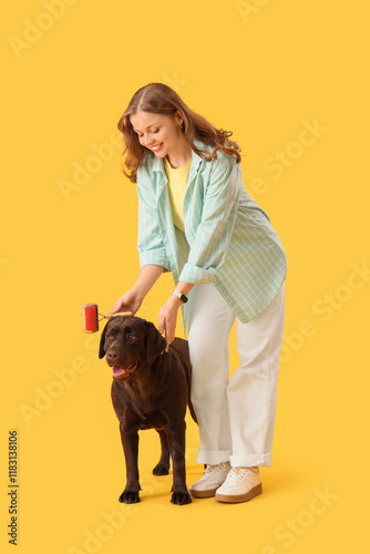 Happy young woman brushing ...