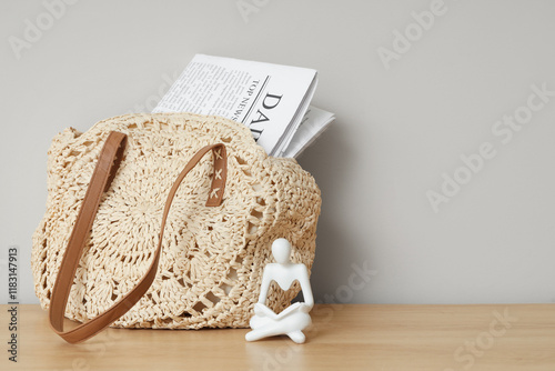 Stylish bag with newspaper ...