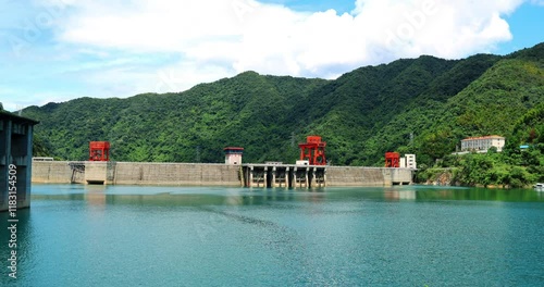 Time lapse of Dongjiang Reservoir dam.The dam body is novel and unique, imposing and magnificent, and it is the first in Asia and the second in the world. It is a double-curved thin-shell arch dam des photo