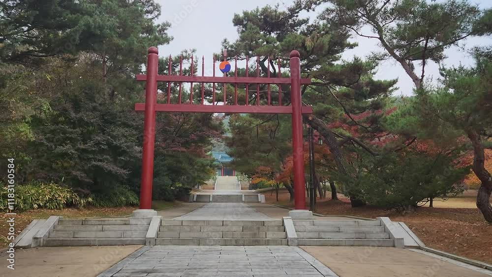 Front view of Hongsalmun Gate with pine trees against Chunguimun Gate of Hyeonchungsa Shrine Front view of Hongsalmun Gate with pine trees against Chunguimun Gate of Hyeonchungsa Shrine