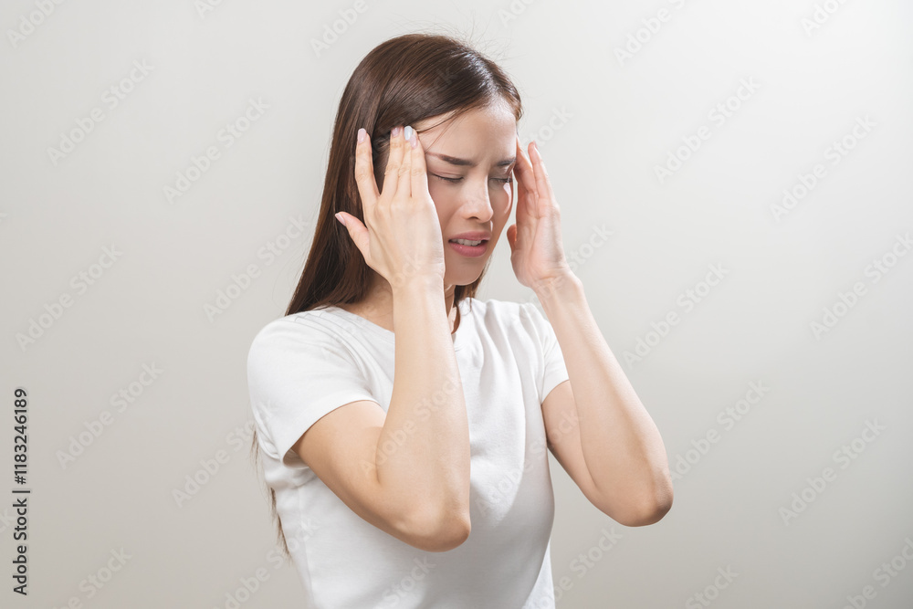 Dizzy asian young woman, girl headache or migraine pain suffering from vertigo or sick, holding head with hand, health problem of brain or inner ear not balance, standing isolated on white background. Dizzy asian young woman, girl headache or migraine pain suffering from vertigo or sick, holding head with hand, health problem of brain or inner ear not balance, standing isolated on white background.