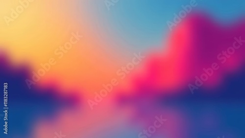 A blurry image of a mountain range with a blue sky in the background