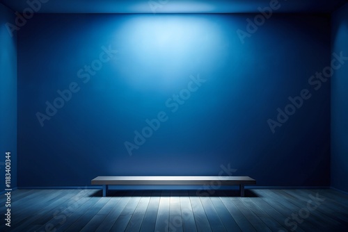dark blue studio with a concrete floor and soft blue lighting, providing a well-edited backdrop for product displays