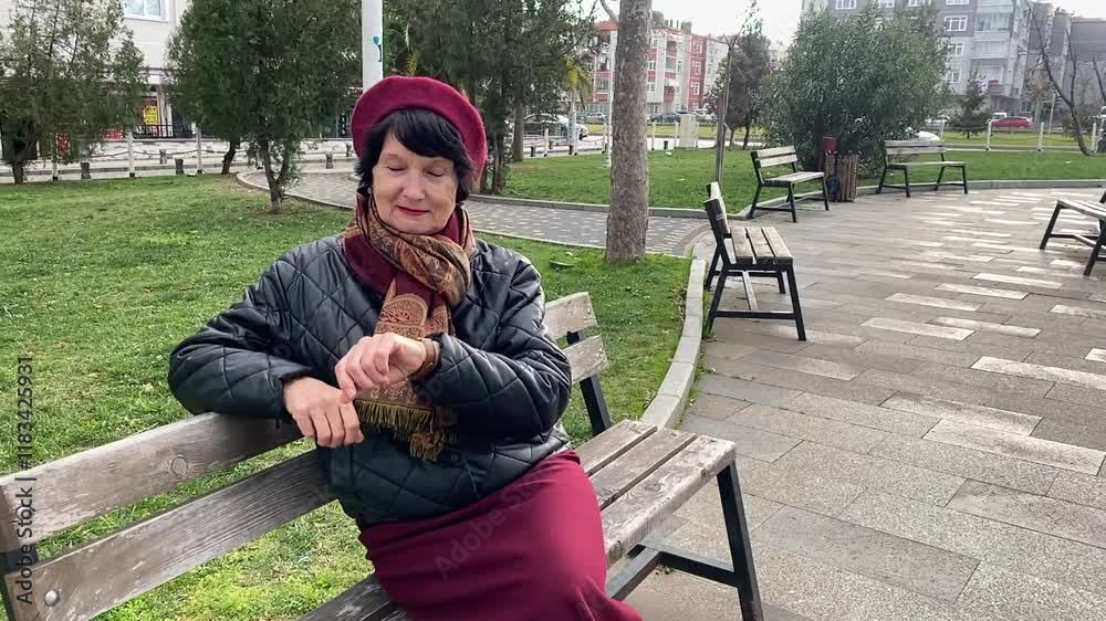 person sitting on bench