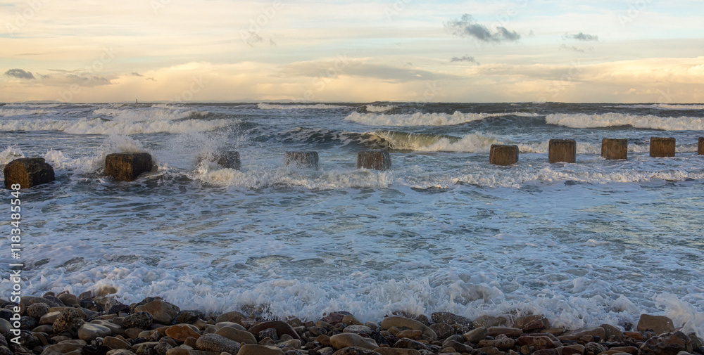 Waves crashing along the coast during a storm Waves crashing along the coast during a storm