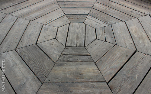 Technology of laying wooden floors in a round room. Old floorboards of a round room