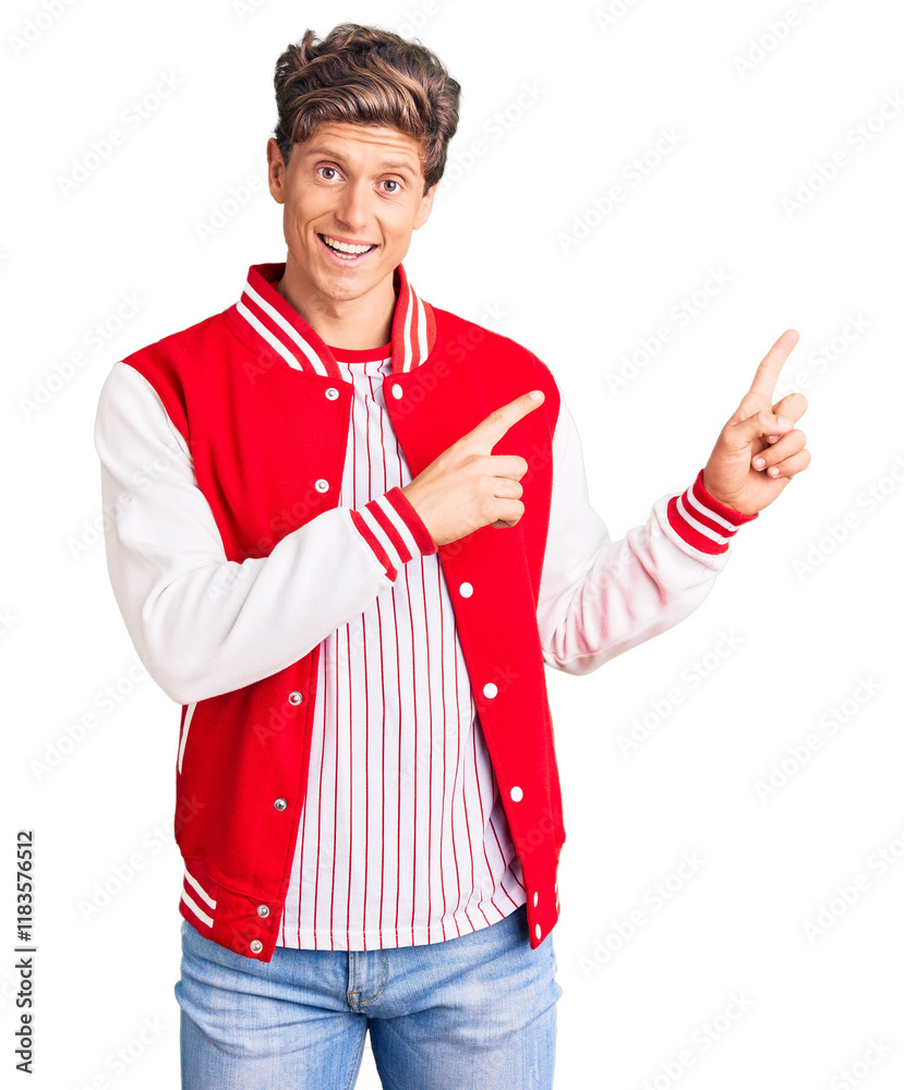 Young handsome man wearing baseball uniform smiling and looking at the camera pointing with two hands and fingers to the side. Young handsome man wearing baseball uniform smiling and looking at the camera pointing with two hands and fingers to the side.