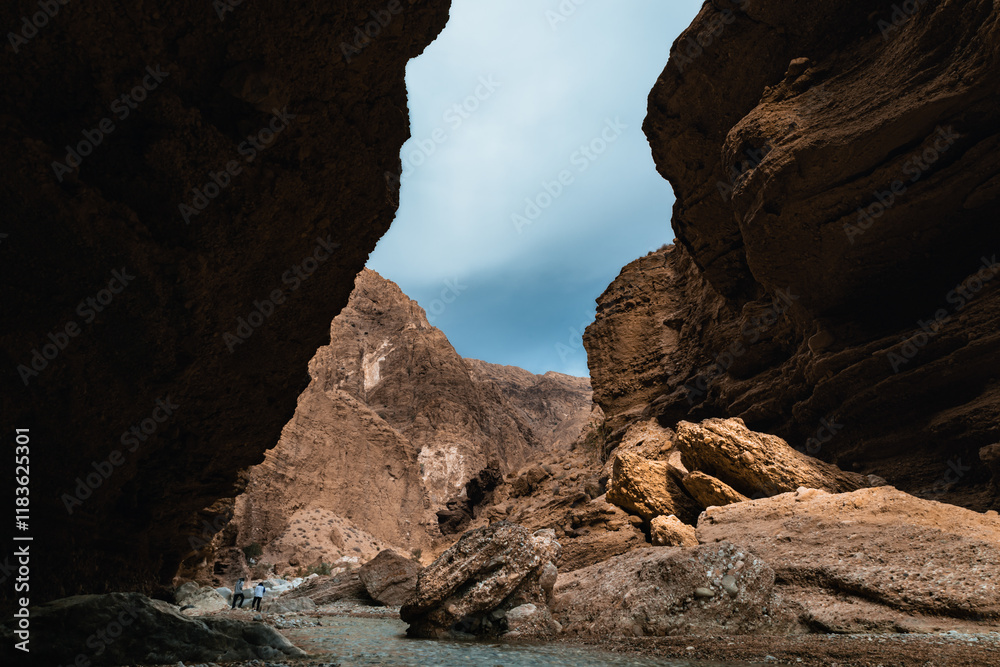 Imposing rock formations in a gorge near Tabas, Iran. A stream flows through the landscape. Photographed on November 12, 2024. Imposing rock formations in a gorge near Tabas, Iran. A stream flows through the landscape. Photographed on November 12, 2024.