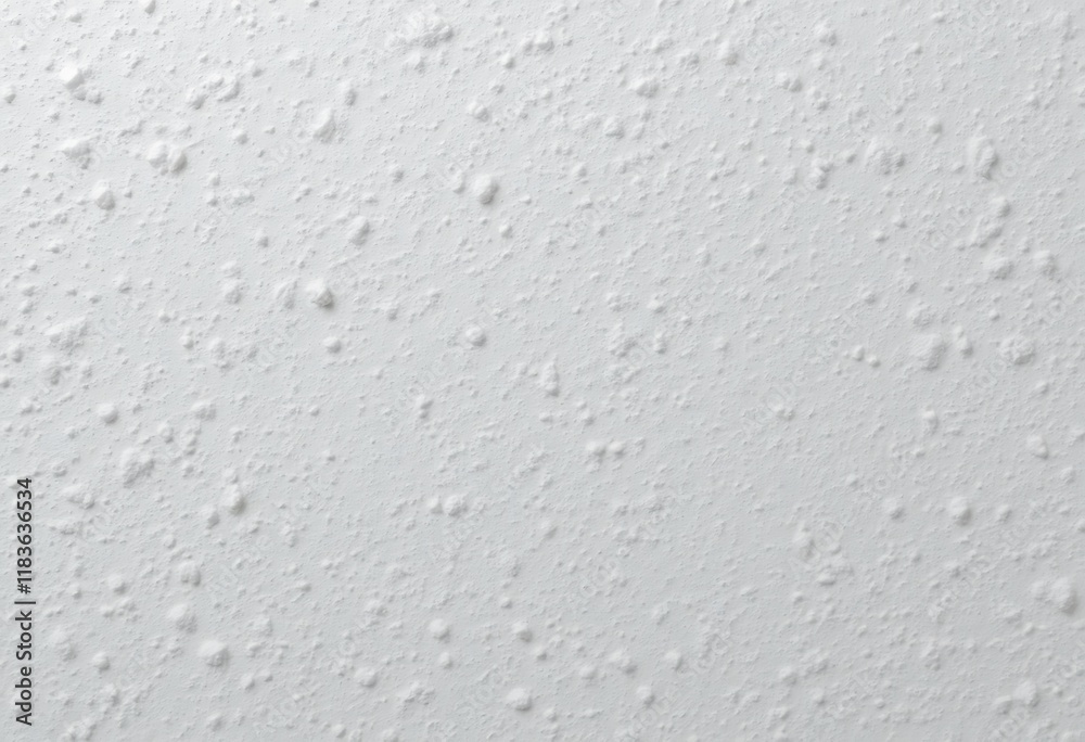 White textured wall surface detail showing subtle bumps White textured wall surface detail showing subtle bumps