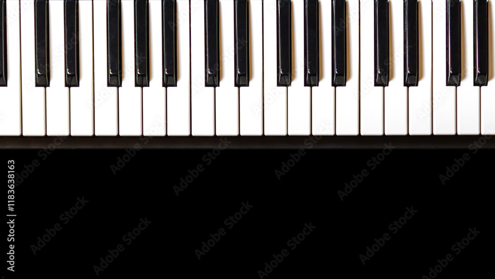 Close up true traditional piano keyboard, white and black keys on black background. Music party banner, celebrate poster, concert invitation. Flatlay photography, top view, copy space. Close up true traditional piano keyboard, white and black keys on black background. Music party banner, celebrate poster, concert invitation. Flatlay photography, top view, copy space.