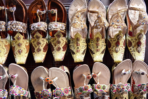 Colorful shoes in souk Dubai,United Arab Emirates. traditional Arabic shoes in east souk photo