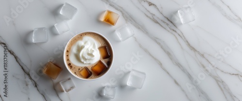 Iced Tea Latte with Frothy Milk and Cubes on Marble Background photo