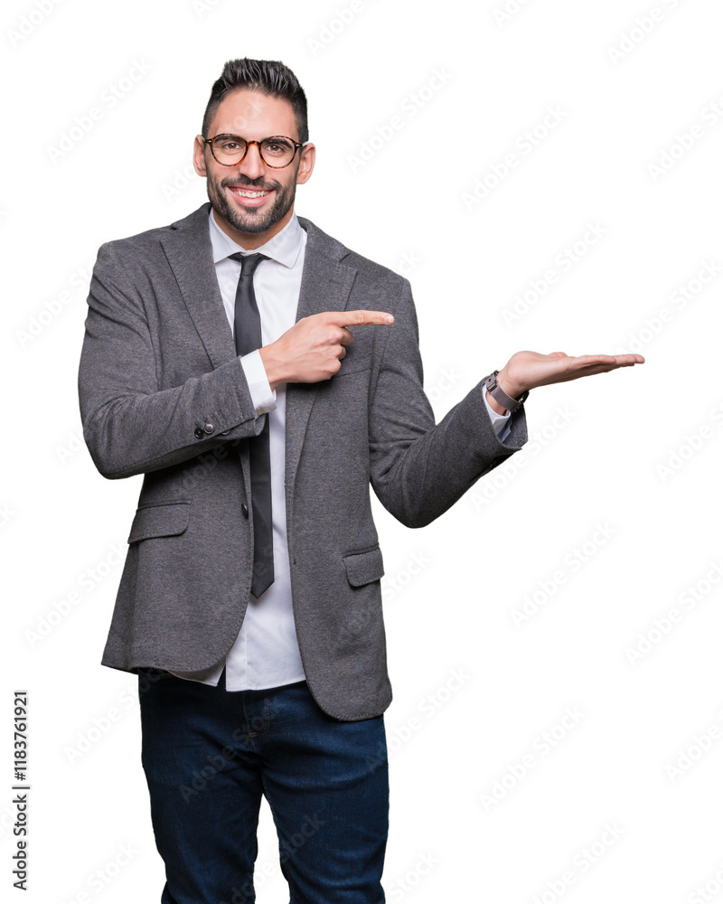 Young handsome business man over isolated background amazed and smiling to the camera while presenting with hand and pointing with finger. Young handsome business man over isolated background amazed and smiling to the camera while presenting with hand and pointing with finger.
